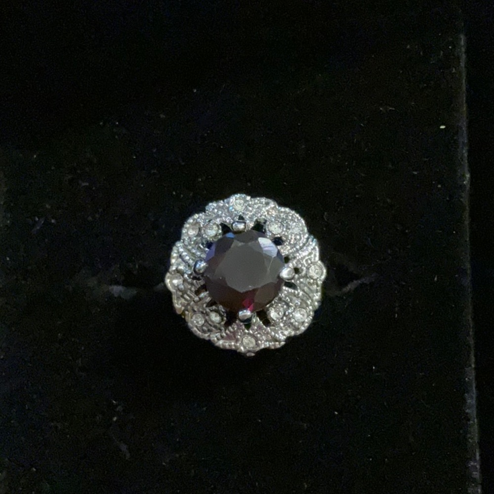 Radiant Purple Amethyst Ring with Intricate Silver Detailing
